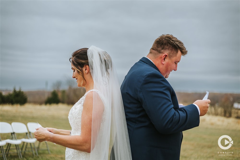 bride and groom exchanging gifts