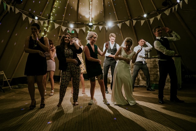 Wedding guests dancing and having a good time.