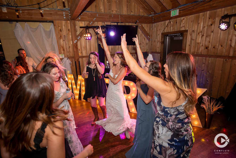 Bride and her wedding guests dancing