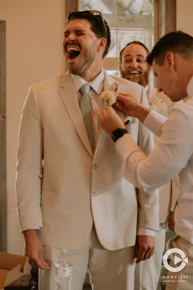 Groom and Groomsmen getting ready on wedding day