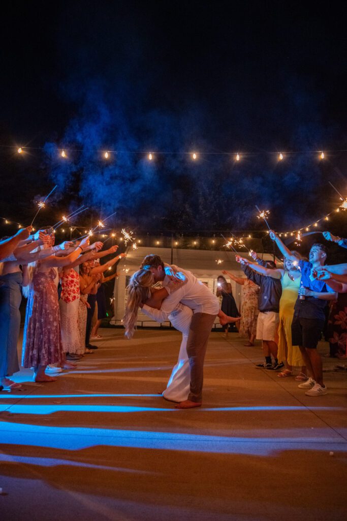 Bride and Groom Celebrates with crowd