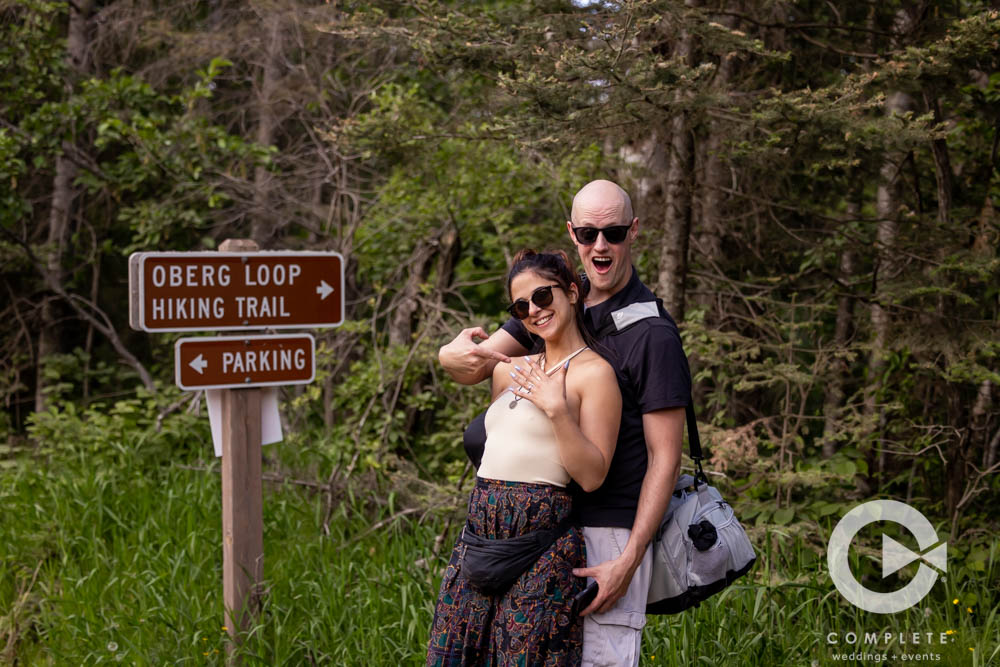 Adam and Nicole next to the Oberg Loop sign