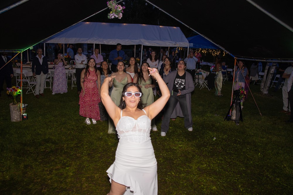 Complete-Wedding-and-Events-Photo-of-Bride-throwing-boquet