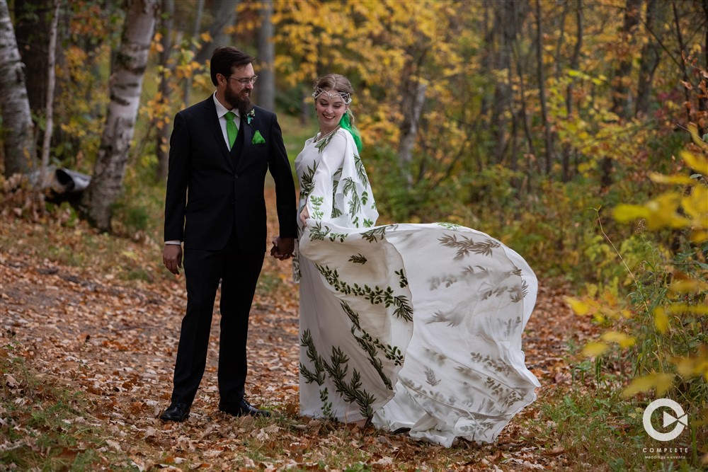 Alex smiles as Gael showing off her bridal dress.