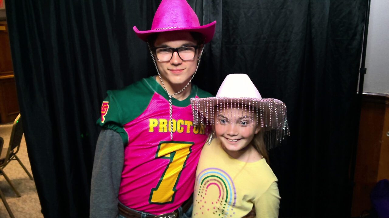 Family, friends, and supporters of Proctor Rails gather at the Spaghetti Feed Fundraiser for an evening of good food and community spirit. Capturing moments of joy, unity, and team pride, with proceeds supporting Proctor Rails Football.