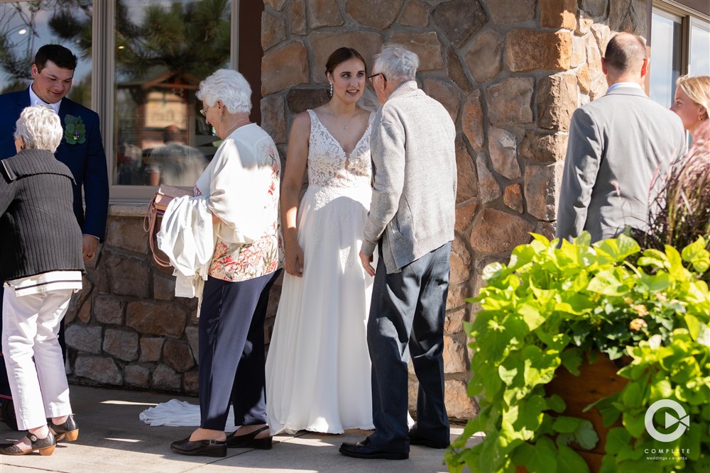 Bride and Groom greet guest