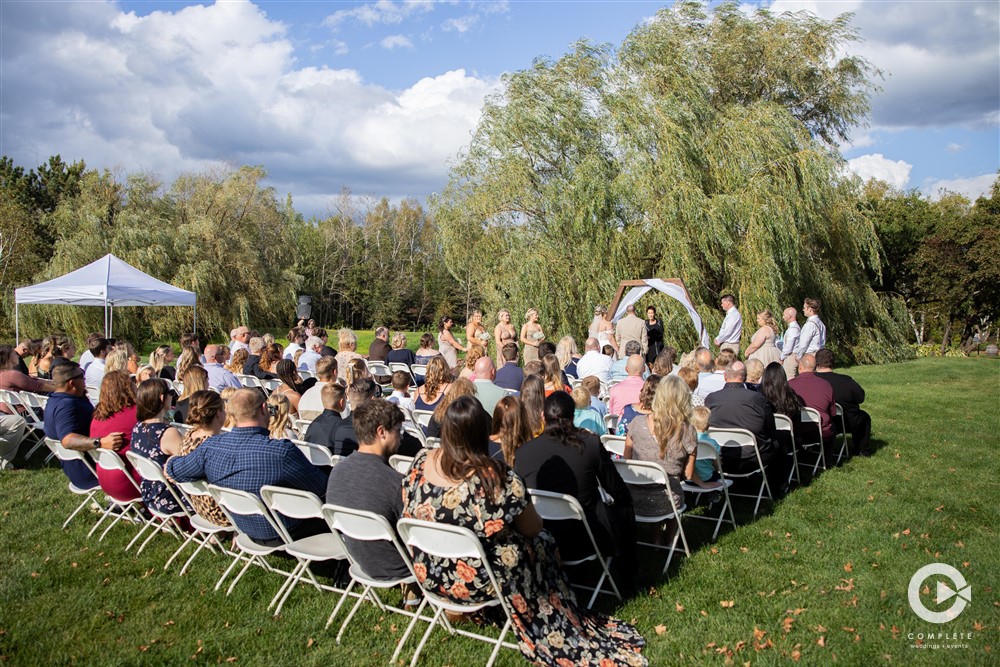 Full shot of wedding ceremony - Complete Weddings + Events Duluth - MN Discovery Center