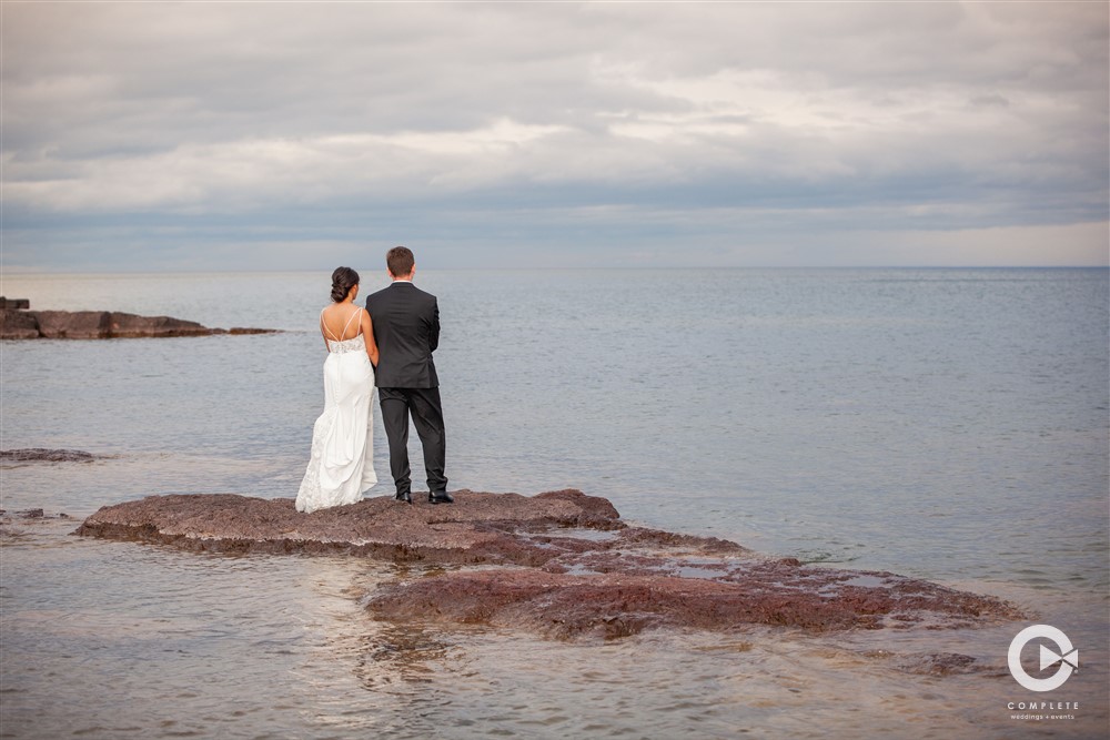 Complete Weddings + Events Duluth – Photographer Yeti - Bride and Groom Lake Superior