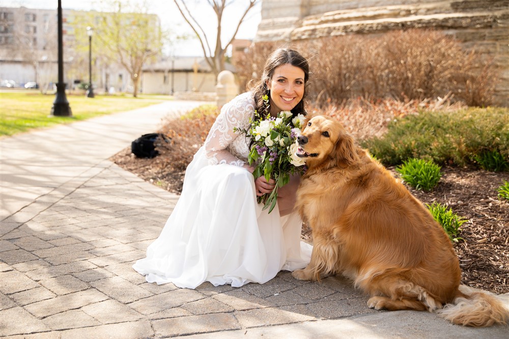 Bride with Dog and flowers by Complete Weddings + Events Duluth