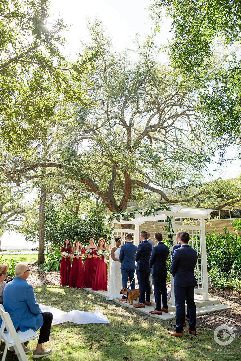 wedding ceremony outdoors under trees