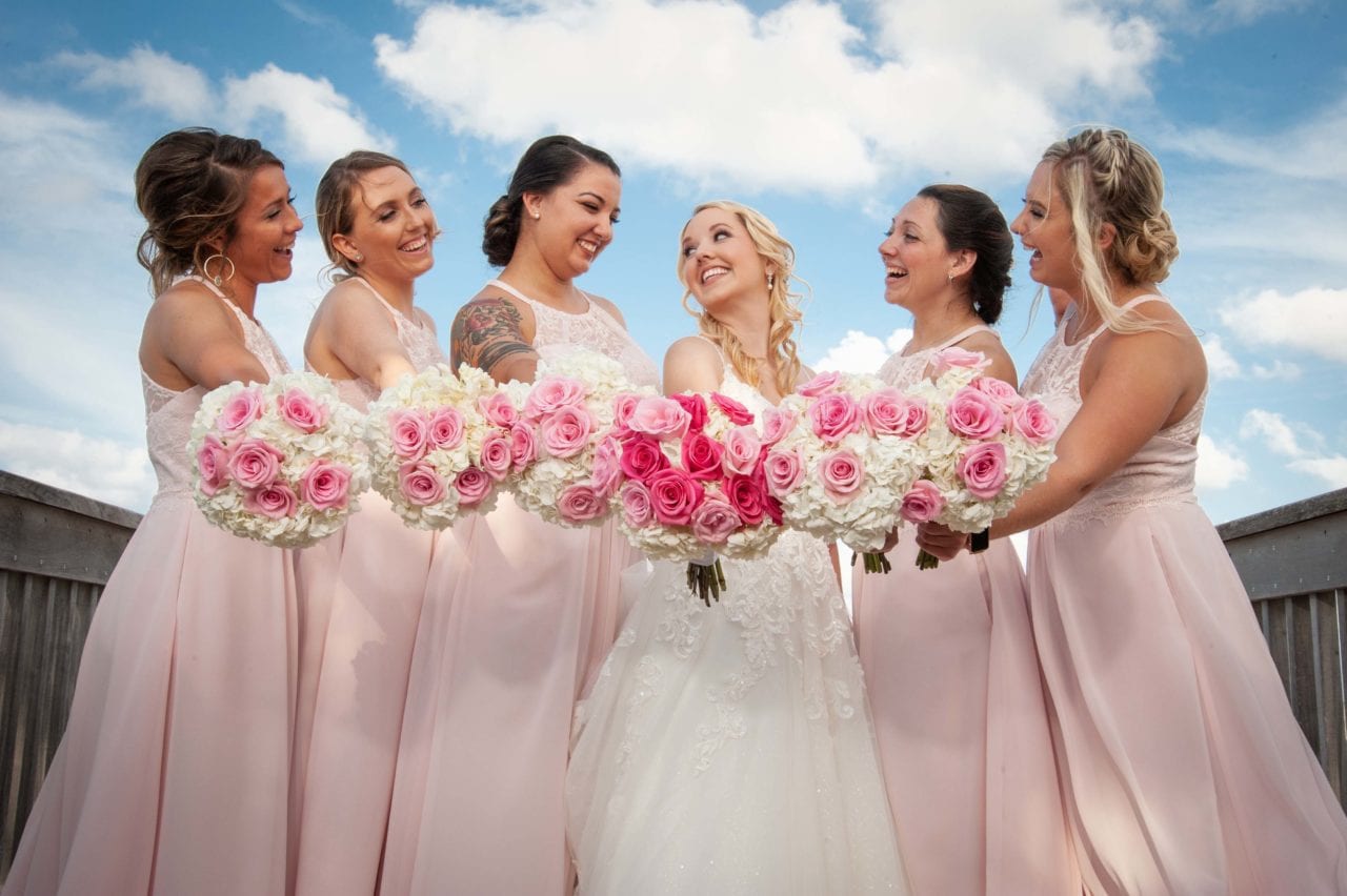 Bride and bridesmaids portrait at Embassy Suites Deerfield Beach
