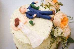 Bride and groom sleeping cake topper