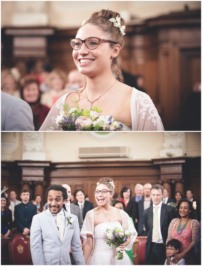 Bride wearing glasses walking with her dad