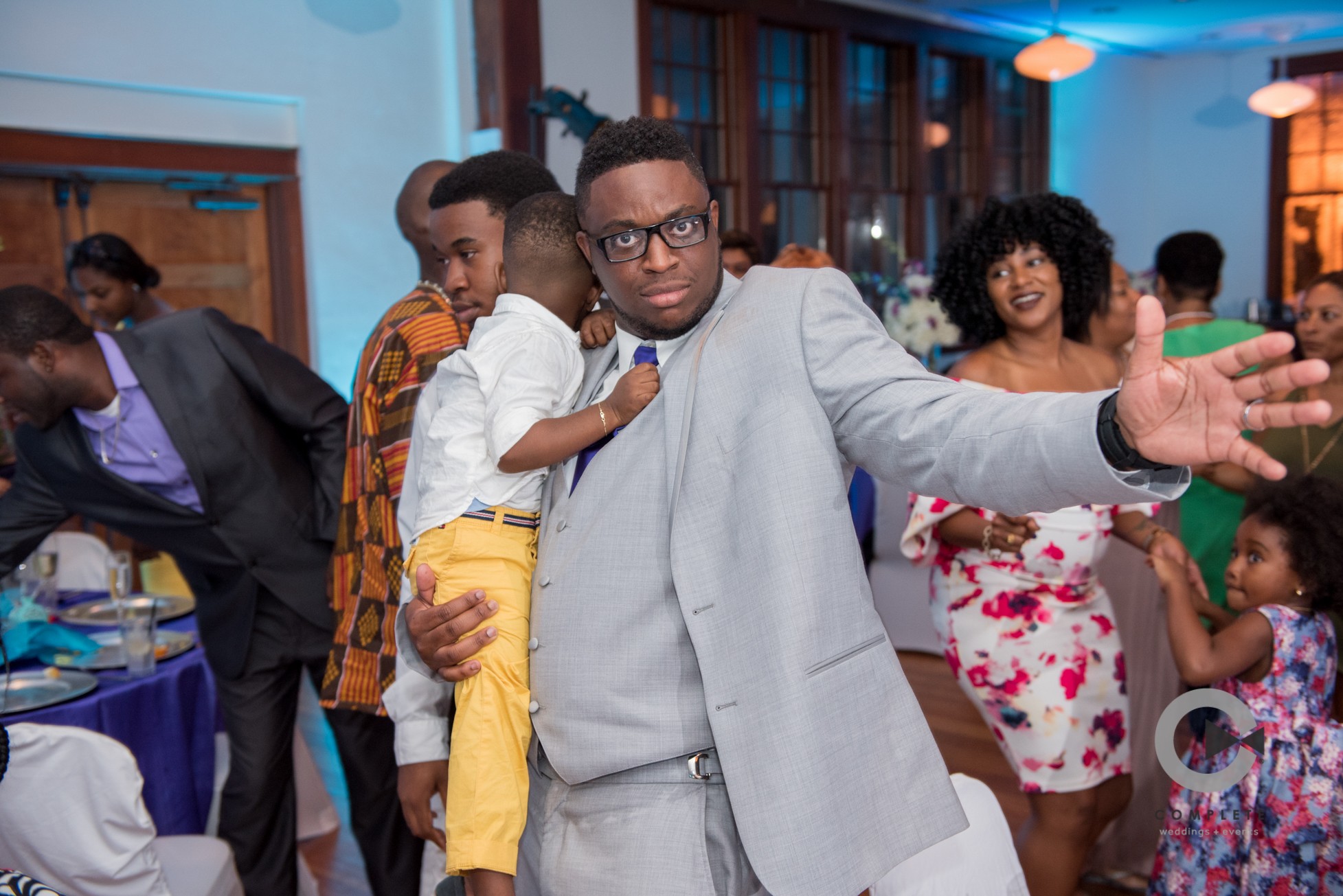 Groom having fun at reception