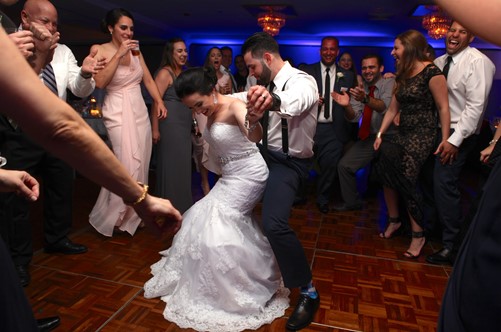 Bride and groom dancing at the reception