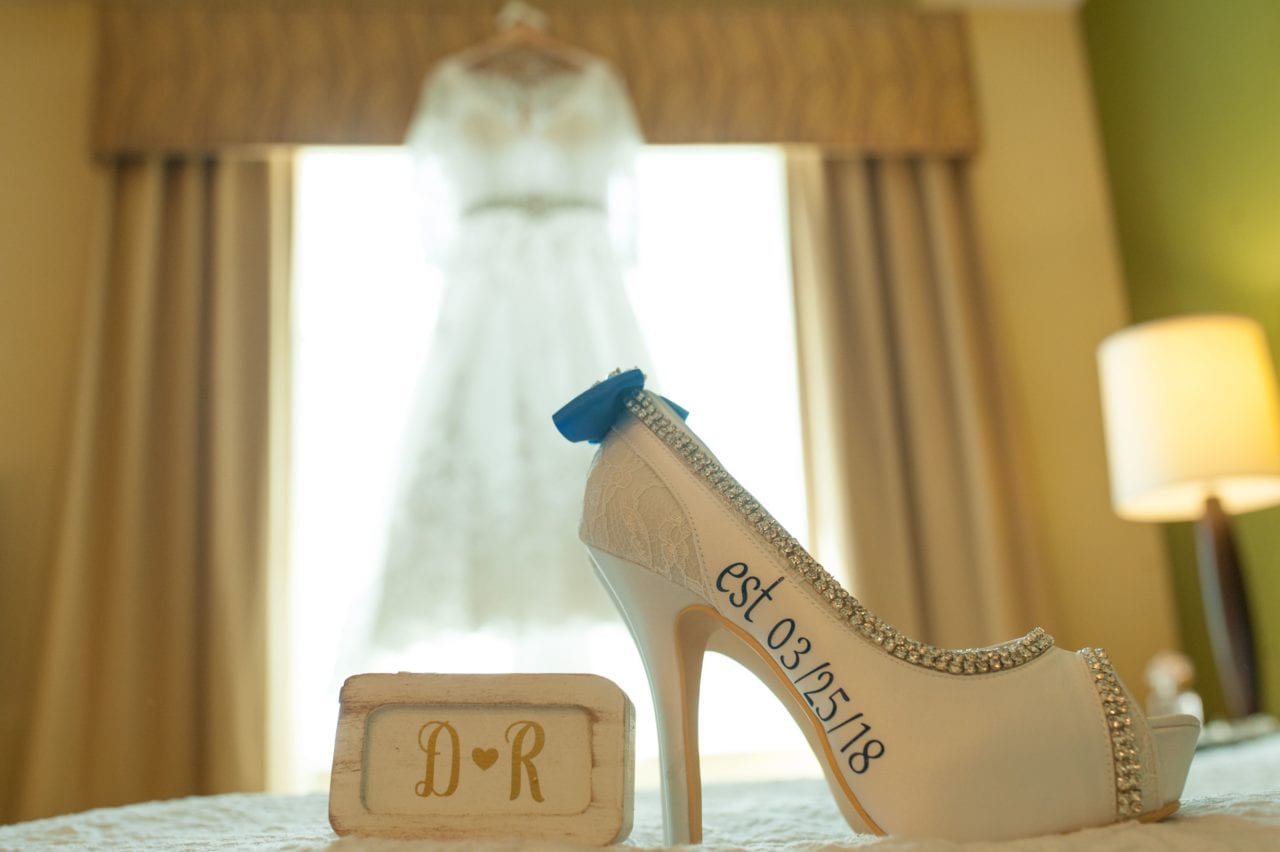 Wedding details of the gown and shoes