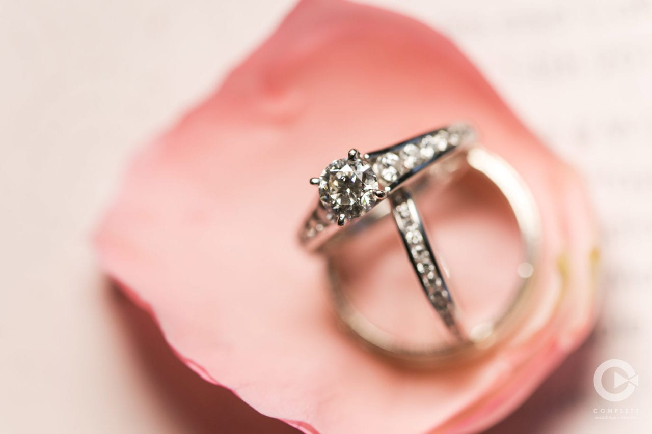 wedding ring stting inside of rose petal