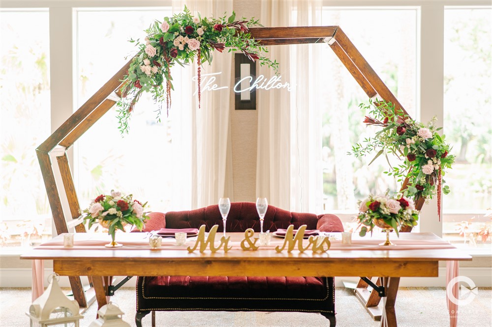 sweetheart table with neon sign