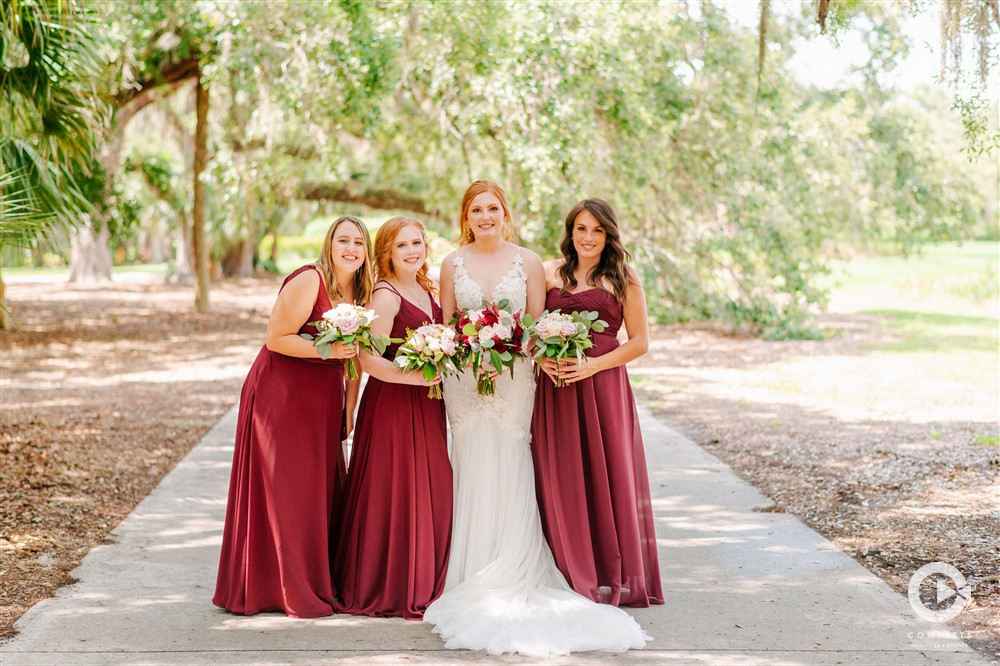 bridesmaids in burgundy dresses