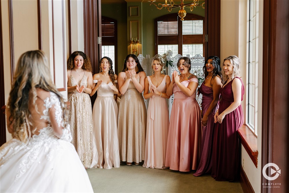 Bridesmaids first look photographed by Complete Fort Myers.