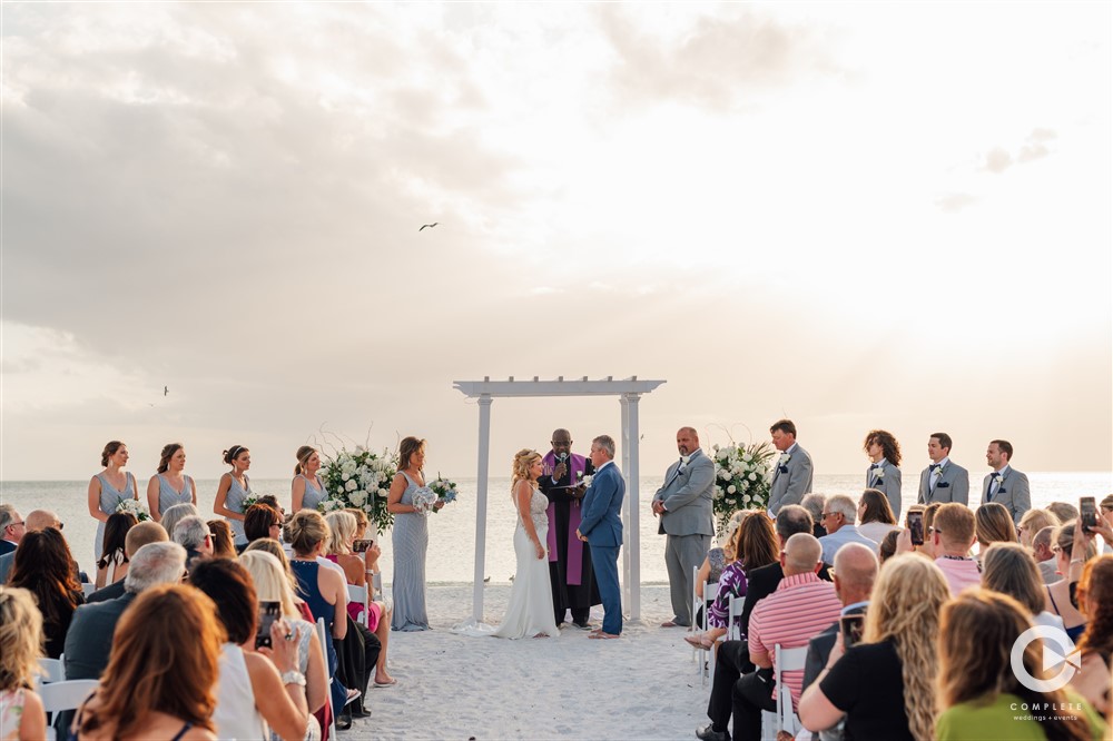 Tess and Chris's bling beach wedding ceremony on Marco Island beach.