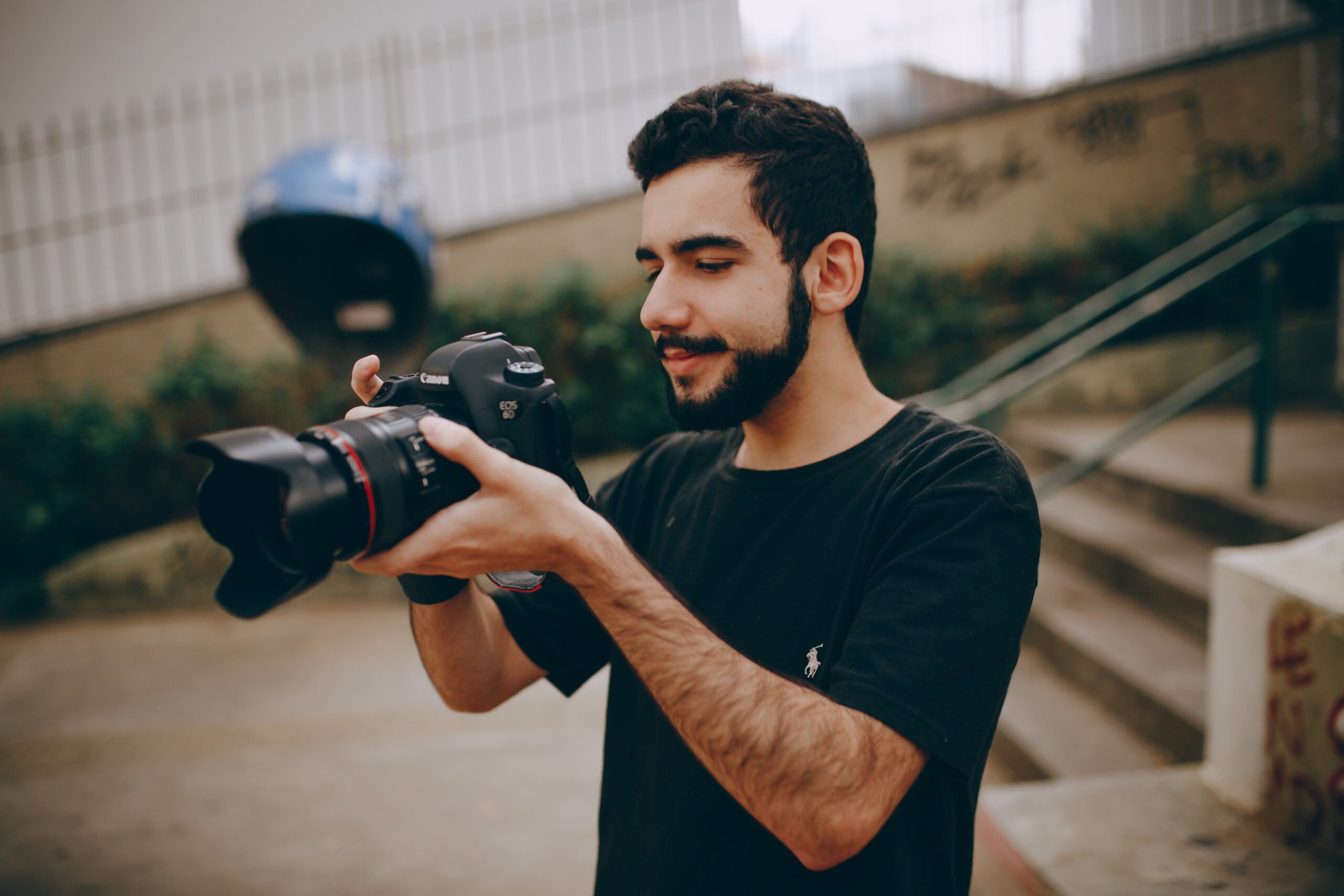 Male Photographer with Commercial-Grade Camera