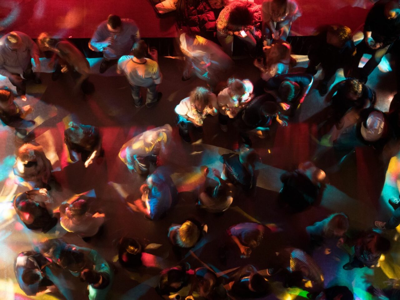 a crowded dance floor as seen from above