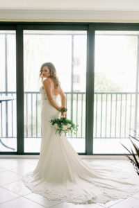 Bride poses with bouquet