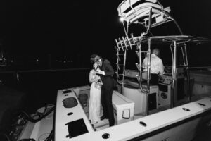 Newlyweds on Boat - Black and White Wedding Photography in Fort Myers