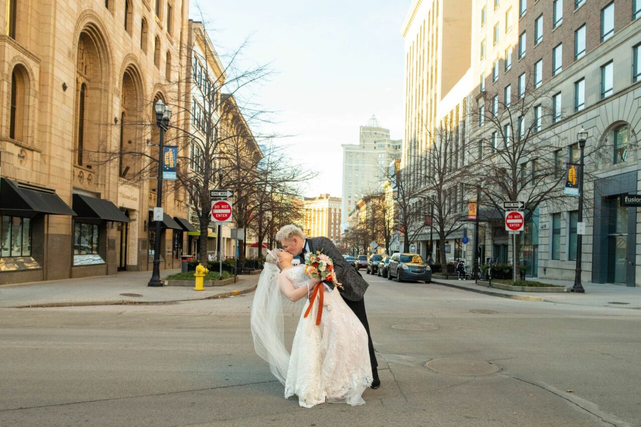 Bride & Groom Kissing in the street of Grand Rapids