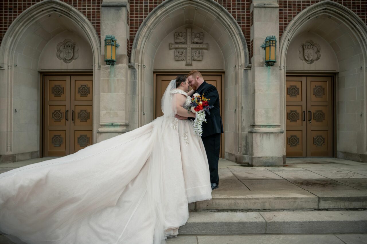 Bride & Groom in front of a church