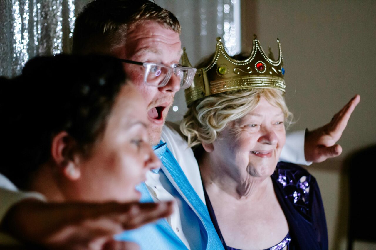 family taking a picture in a photo booth