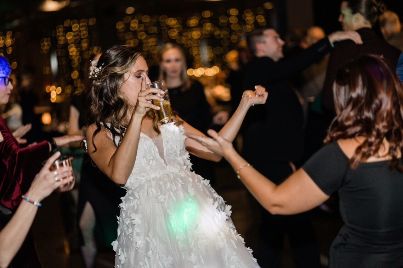 bride showing her best dance moves