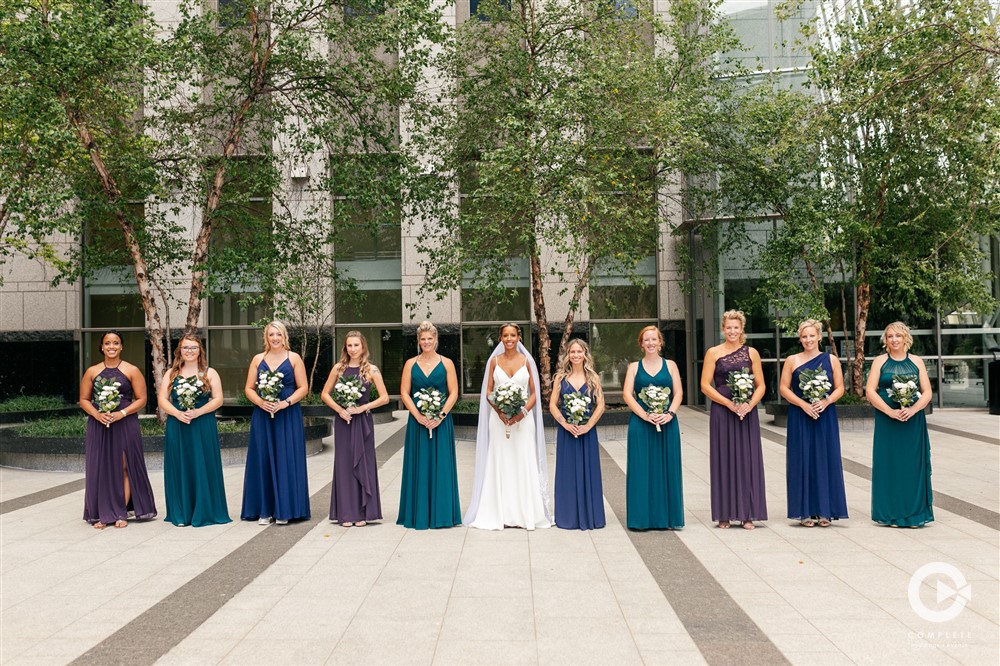 varying colors of bridesmaid dresses