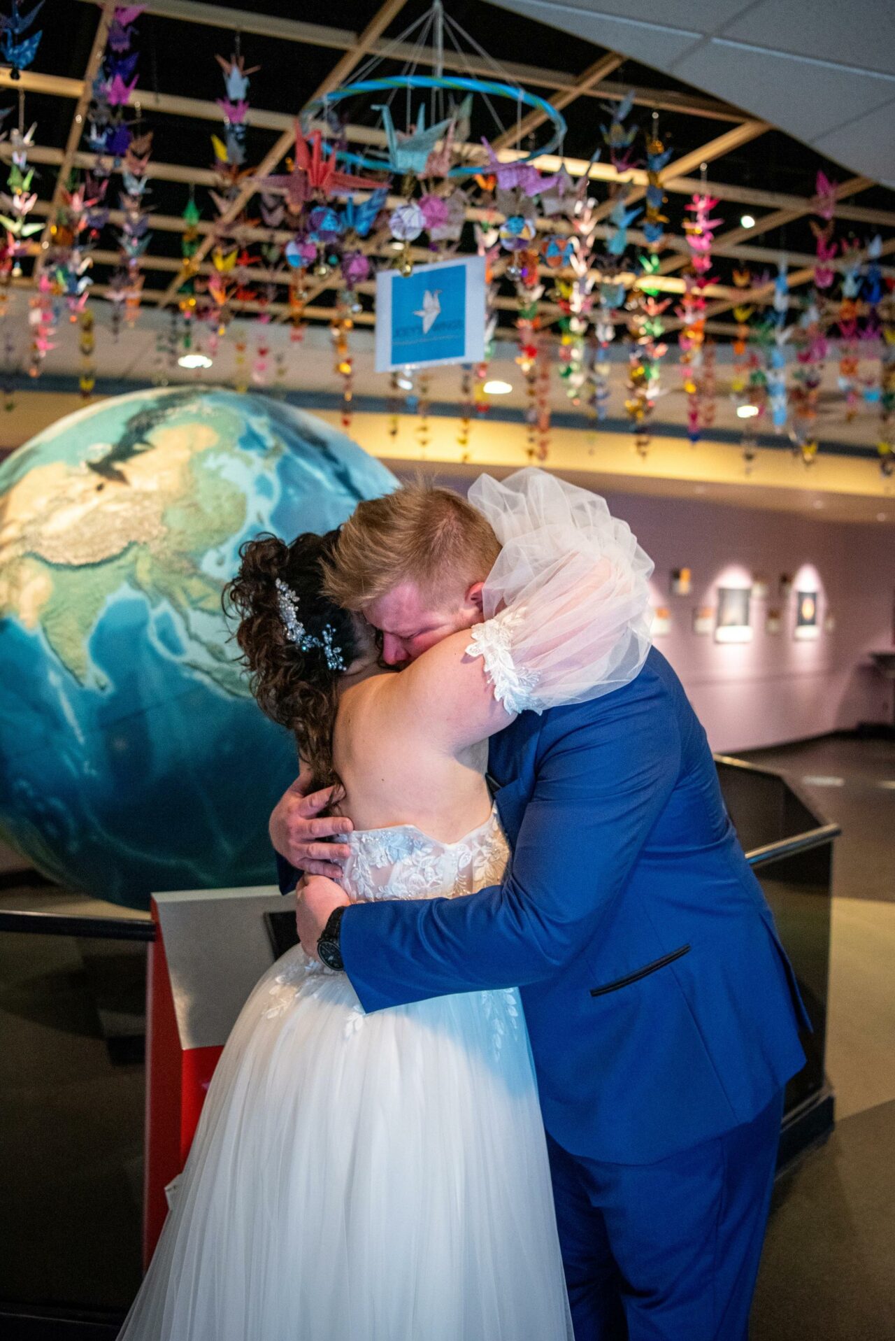 bride and groom hugging on first look Photography by Andrea LaVoy