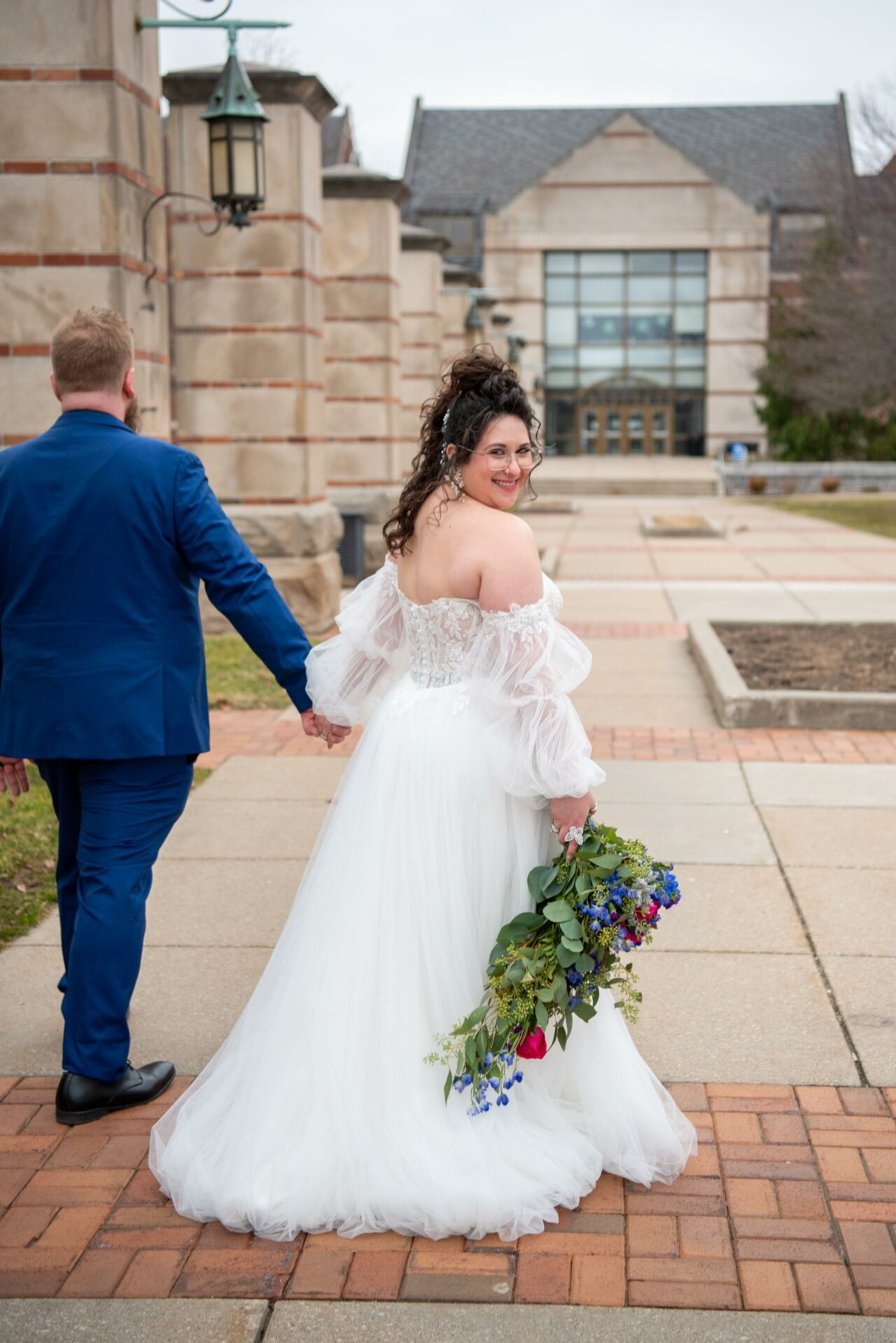 Bride turning to see us Photography by Andrea LaVoy