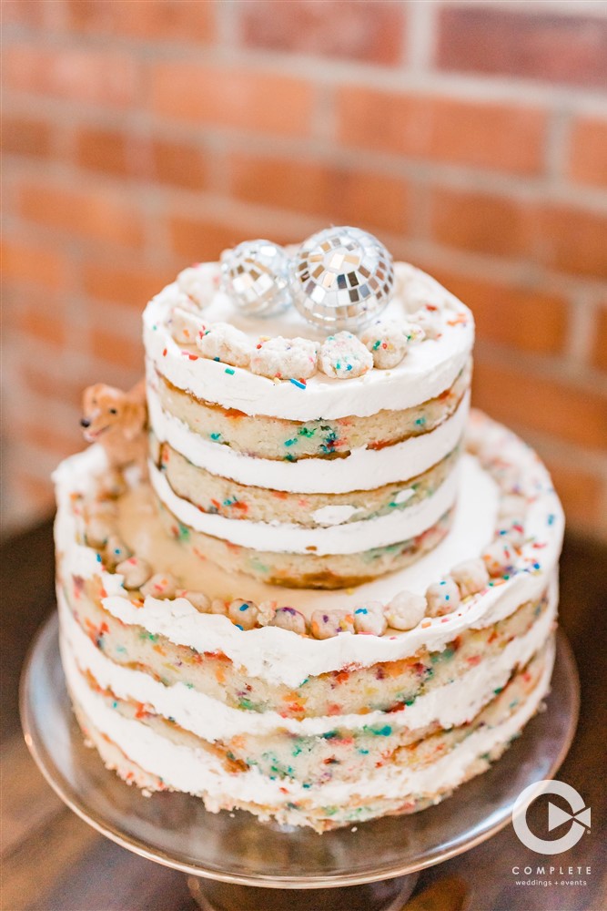 confetti cake with disco ball topper