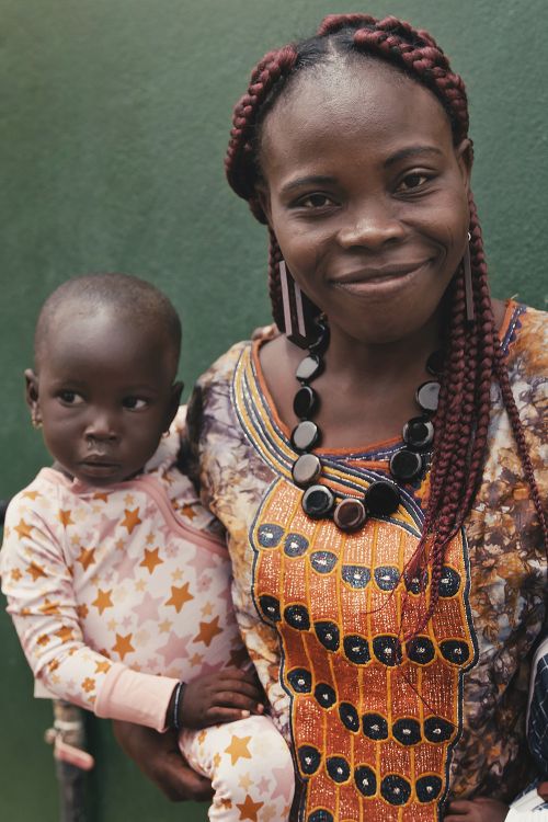 African mother holding baby