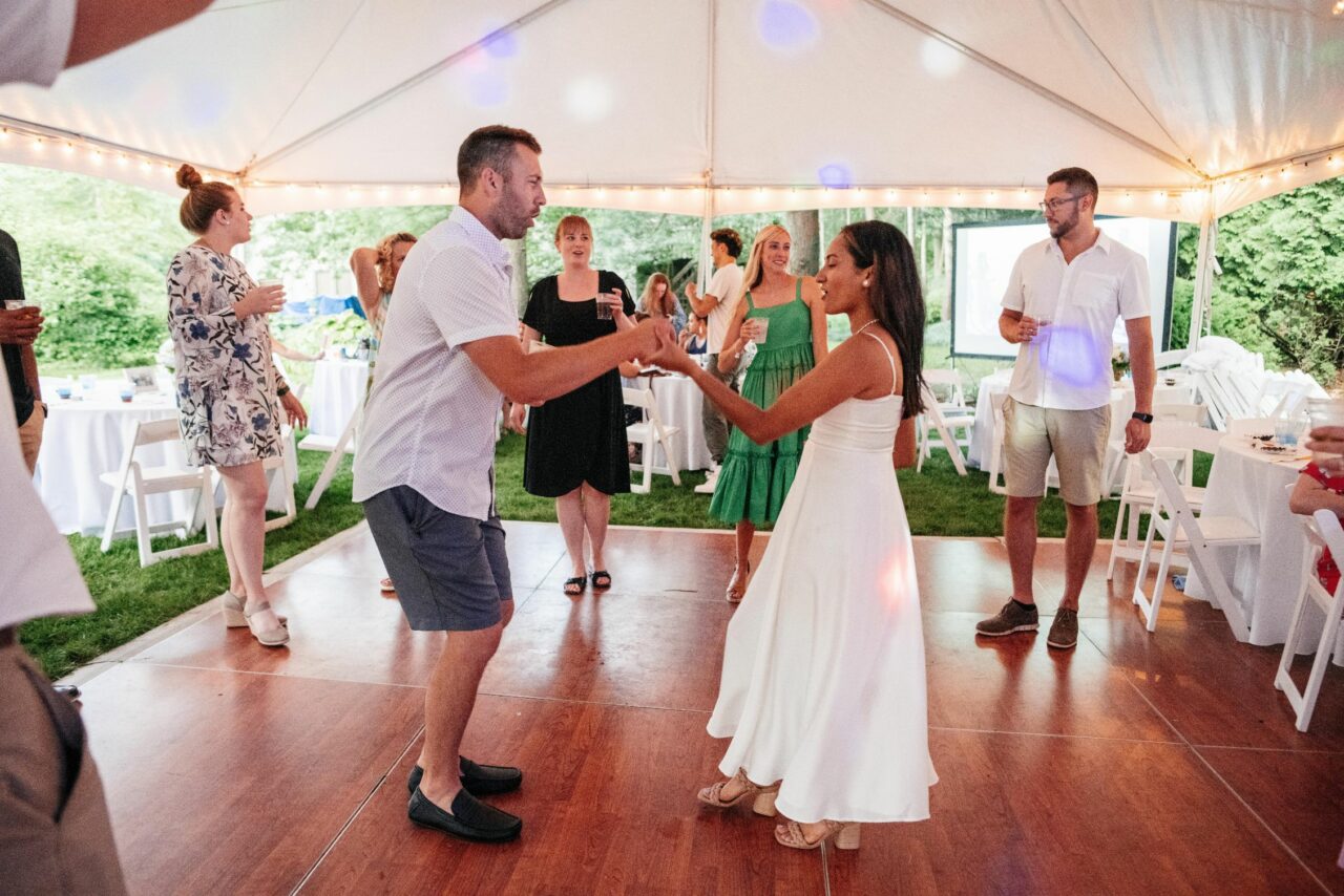 Guests dancing at a home wedding