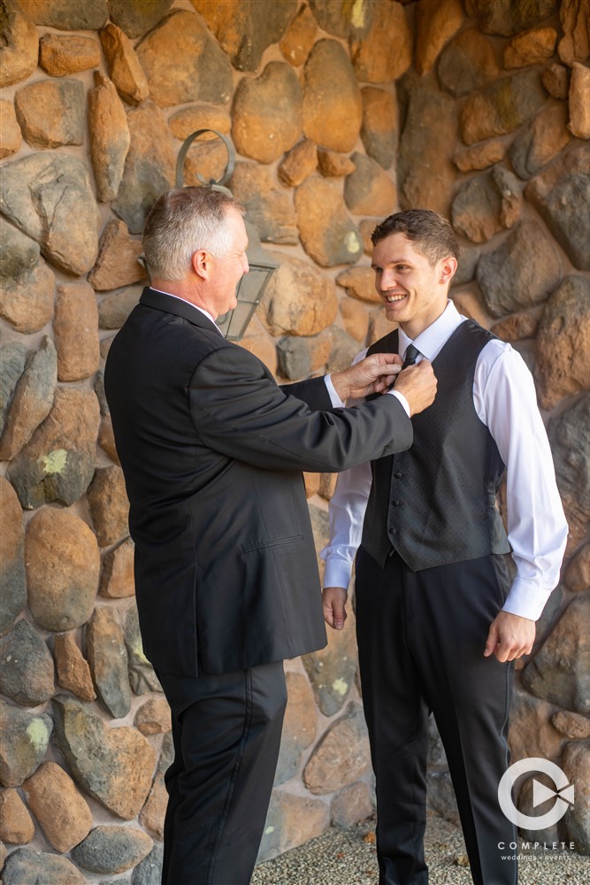 groom and father getting ready