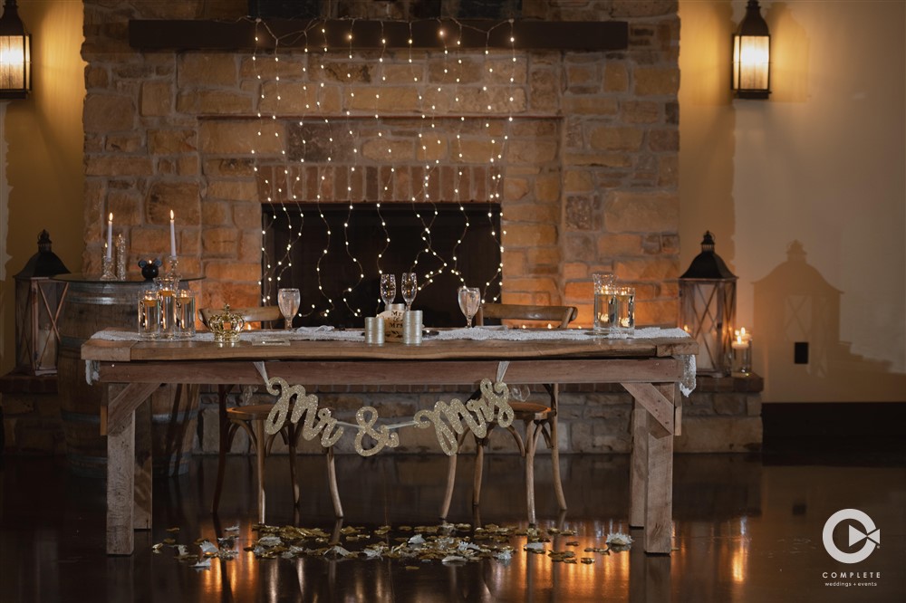 BARN AT BAY HORSE INN WEDDING VENUE GREENWOOD INDIANAPOLIS INDIANA HANDCRAFTED FARM TABLE USED FOR HEAD TABLE