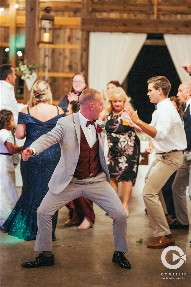 WEDDING MUSIC MISTAKES TO AVOID INDIANAPOLIS DANCE FLOOR FUN WITH GROOM