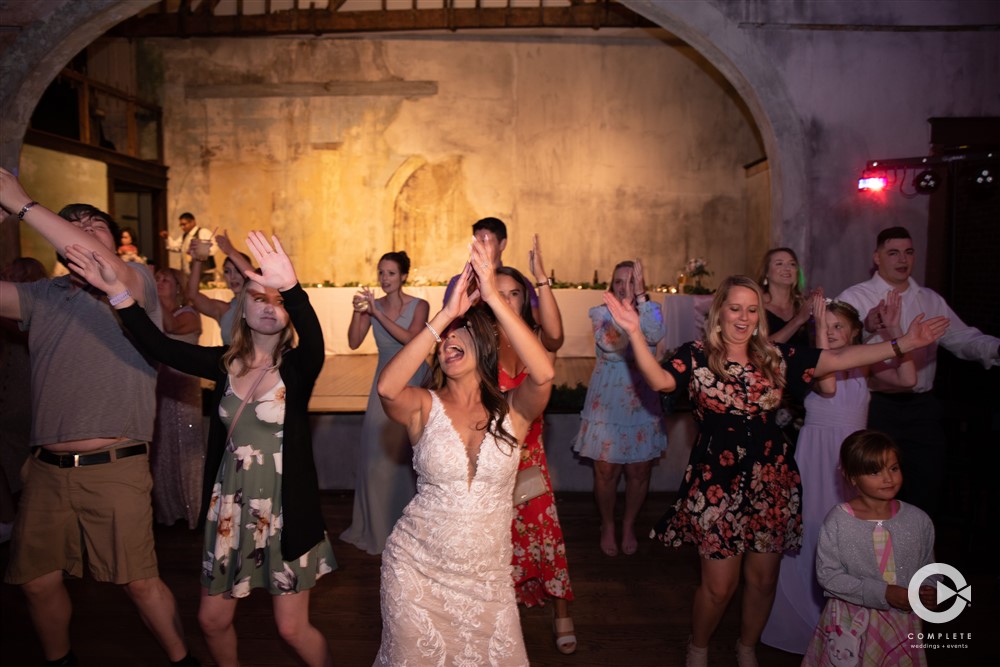 WEDDING MUSIC MISTAKES TO AVOID BRIDE LEADS CHA CHA SLIDE DURING WEDDING IN INDIANAPOLIS