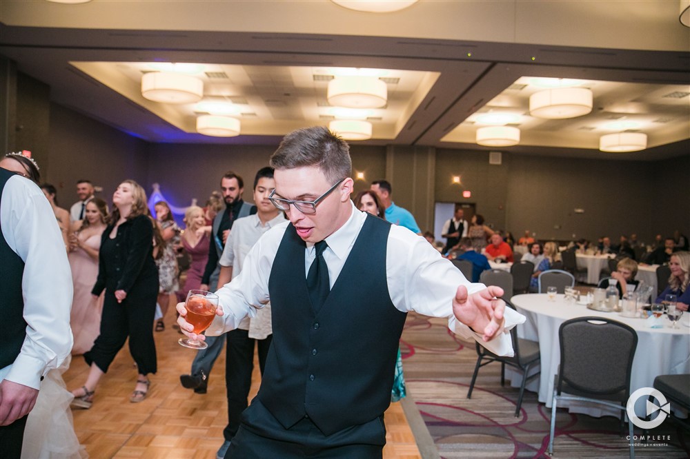 Groomsmen dancing to reception dance music during North Florida wedding reception