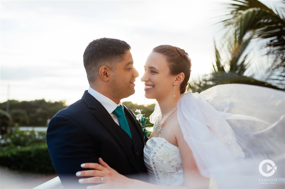 Jacksonville beach wedding bride and groom looking at each other beautiful photo