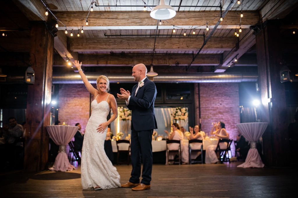 The new Mr. and Mrs. one the dance floor for their first dance at the Hobbs Building. Event lighting in Kansas City