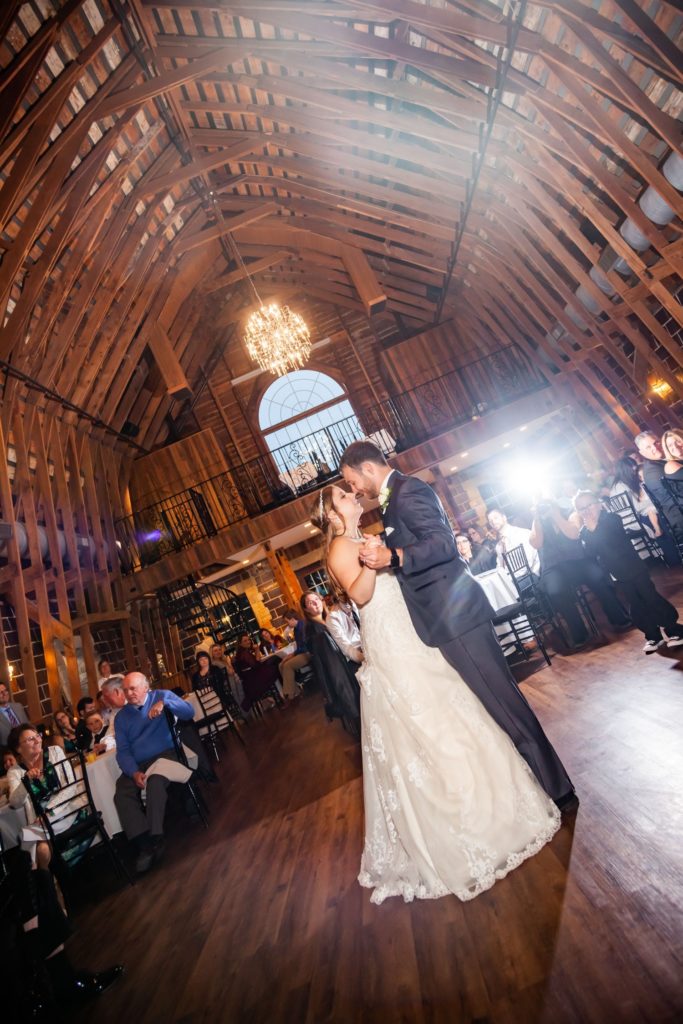 Bride and groom dancing first dance with music provided by a Kansas City DJ.