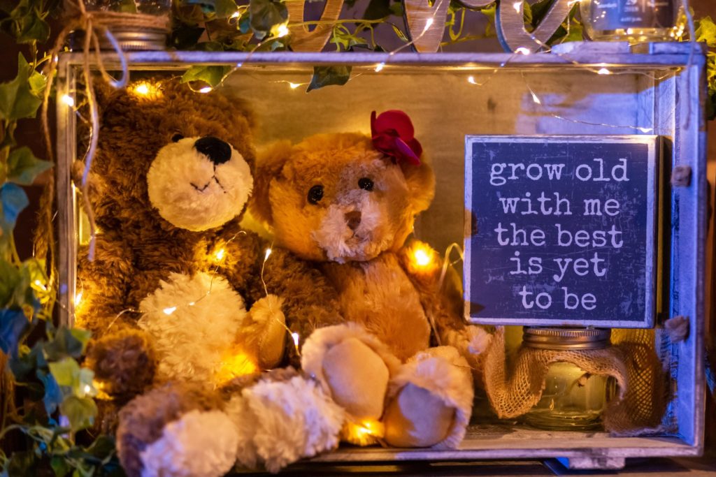 Photo of teddy bears with a sign at a wedding near Kansas City.