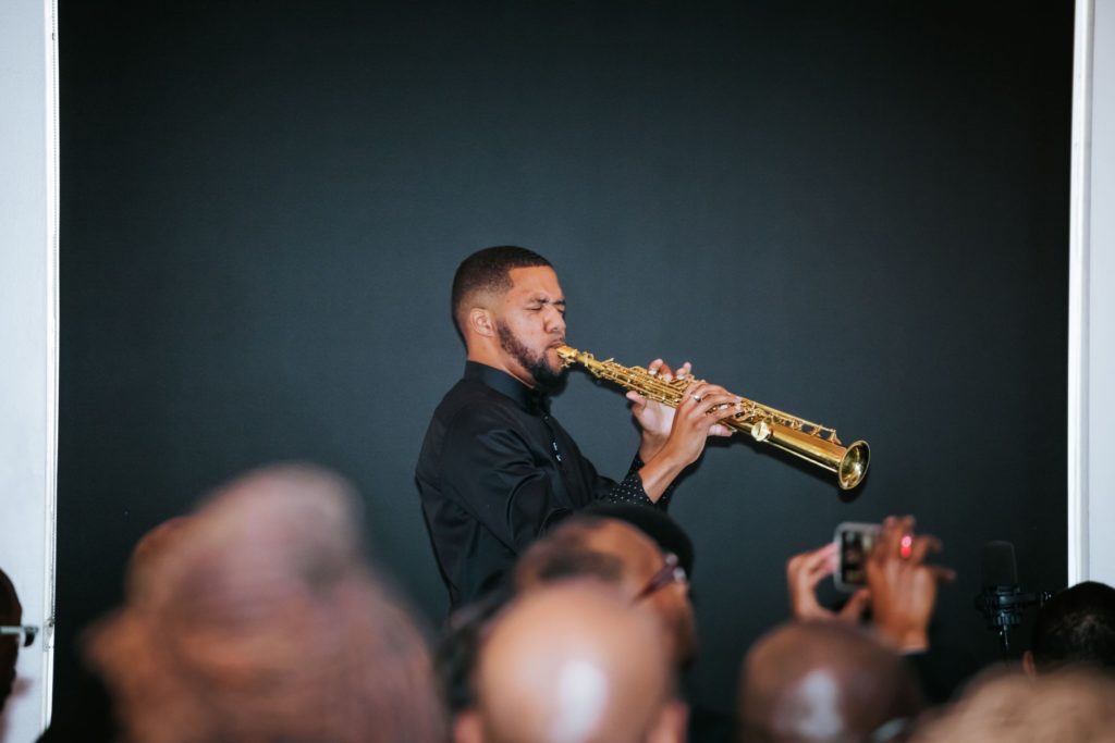 Soprano saxophone player performing for the unity part of a wedding ceremony in Kansas City