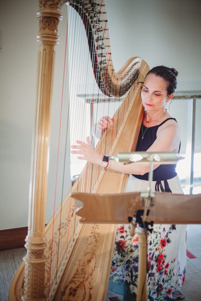 Wedding Harpist plays at a wedding ceremony at Arrowhead Stadium in Kansas City